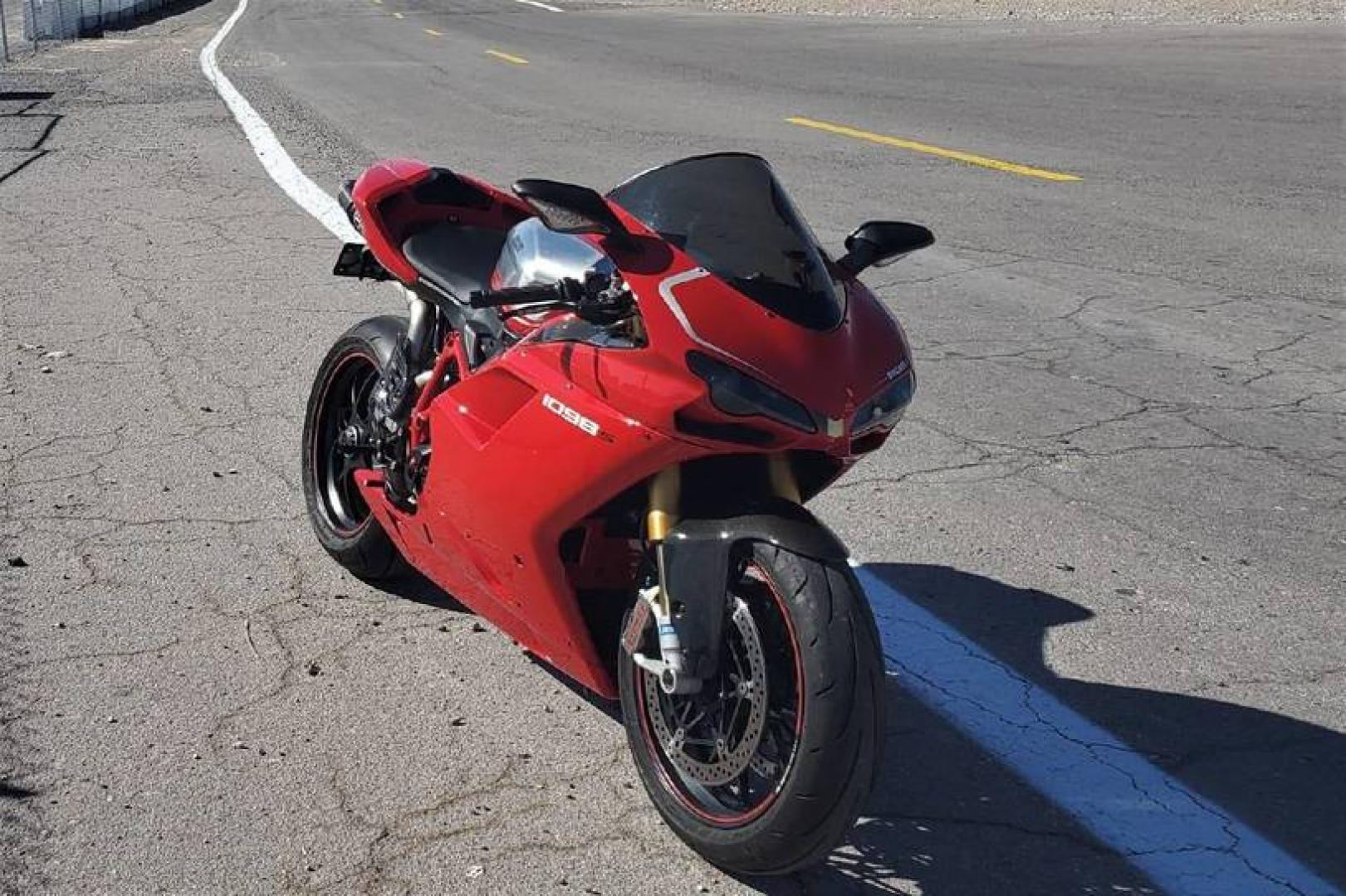 2008 Ducati 1099 S S (ZDM1XBEW18B) with an 1,098 cc L twin engine, Six-Speed Dry Clutch transmission, located at 1313 Las Vegas Blvd, North Port, FL, 34286, (888) 750-6845, 36.002834, -115.201302 - The Ducati 1098S boasts some gorgeous bodywork and slick design cues, but its real masterpiece lies beneath those pretty plastic panels. Underneath is a tubular steel trellis frame optimized for stiffness, and an L-twin engine produces 160 horsepower and 90.4 lb-ft of torque, routing exhaust fumes t - Photo#4