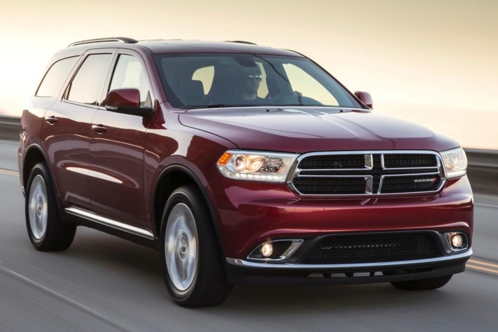 2014 Burgundy /Tan Dodge Durango Limited AWD (1C4RDJDGXEC) with an 3.6L V6 DOHC 24V engine, 8-Speed Automatic transmission, located at 1313 Las Vegas Blvd, North Port, FL, 34286, (888) 750-6845, 36.002834, -115.201302 - Thanks to its welcoming interior and excellent highway manners, the 2014 Dodge Durango is a great choice for a seven-passenger SUV. vehicle overview The 2014 Dodge Durango is one of our favorite options for a six- or seven-passenger SUV. The current generation not only has the roomy seating and - Photo#1
